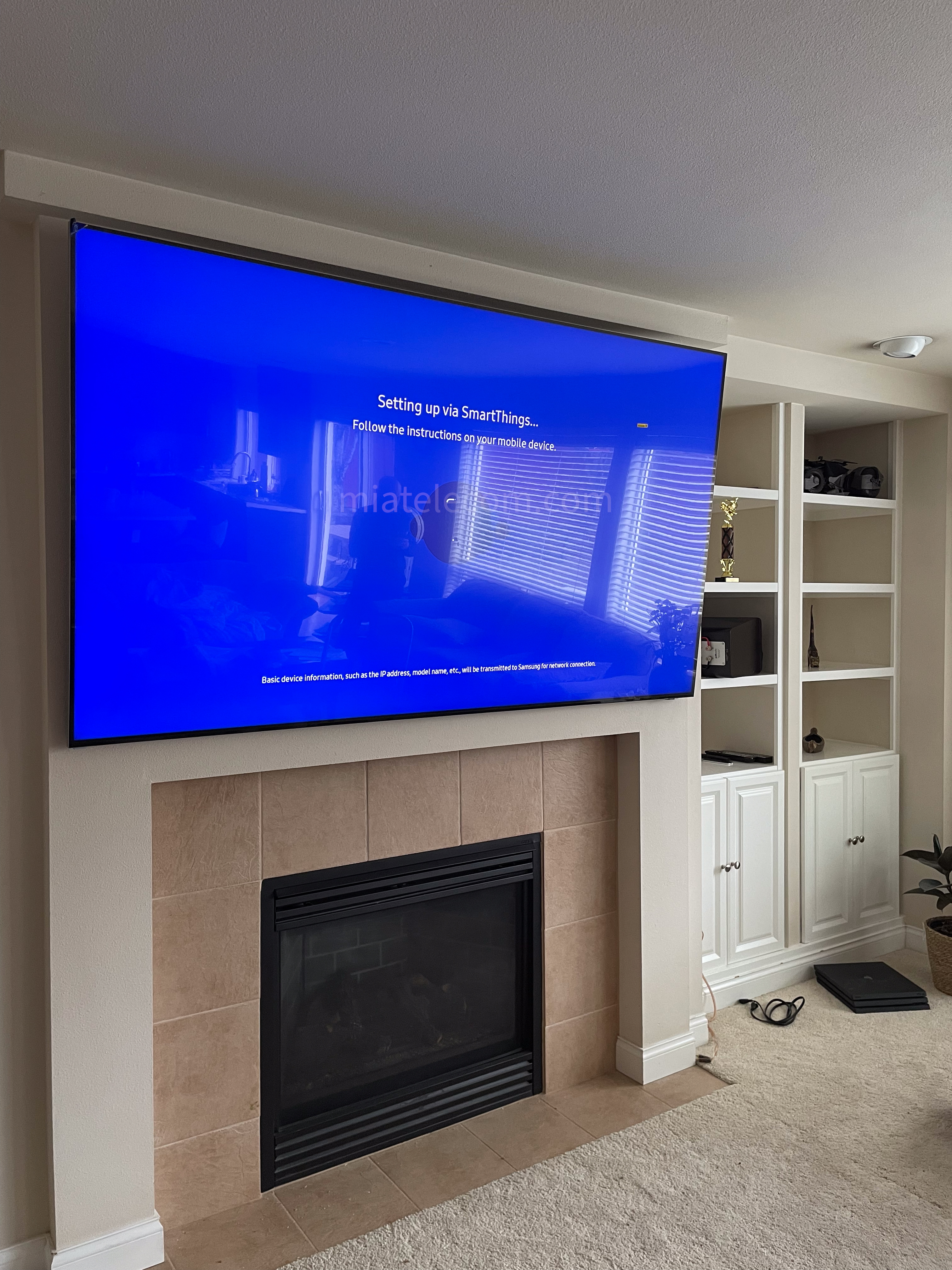 85'' on Drywall Over The Fire Place w/ Electrical Outlet Behind and Sanus Full Motion Mount